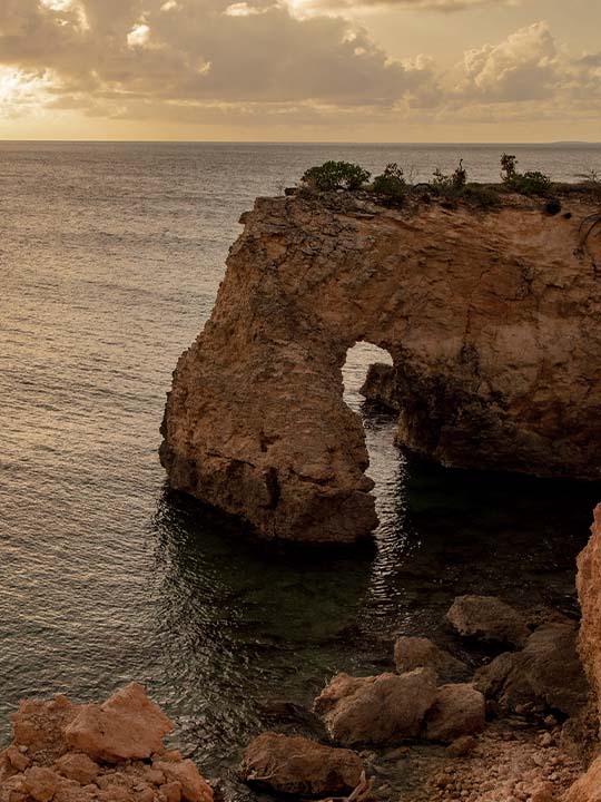 Aurora Anguilla Ocean View at Sunset with with Rock Formations
